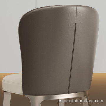 Silla de comedor con respaldo suave tapizado de lujo